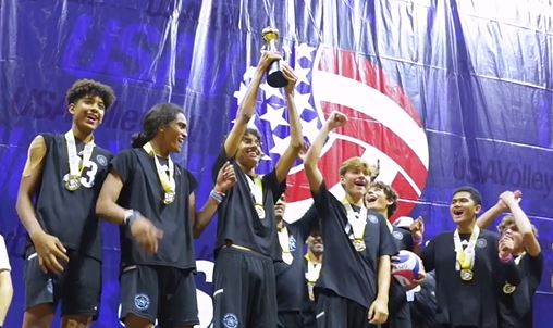 Boys raising trophy