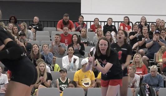 Coach cheering her team