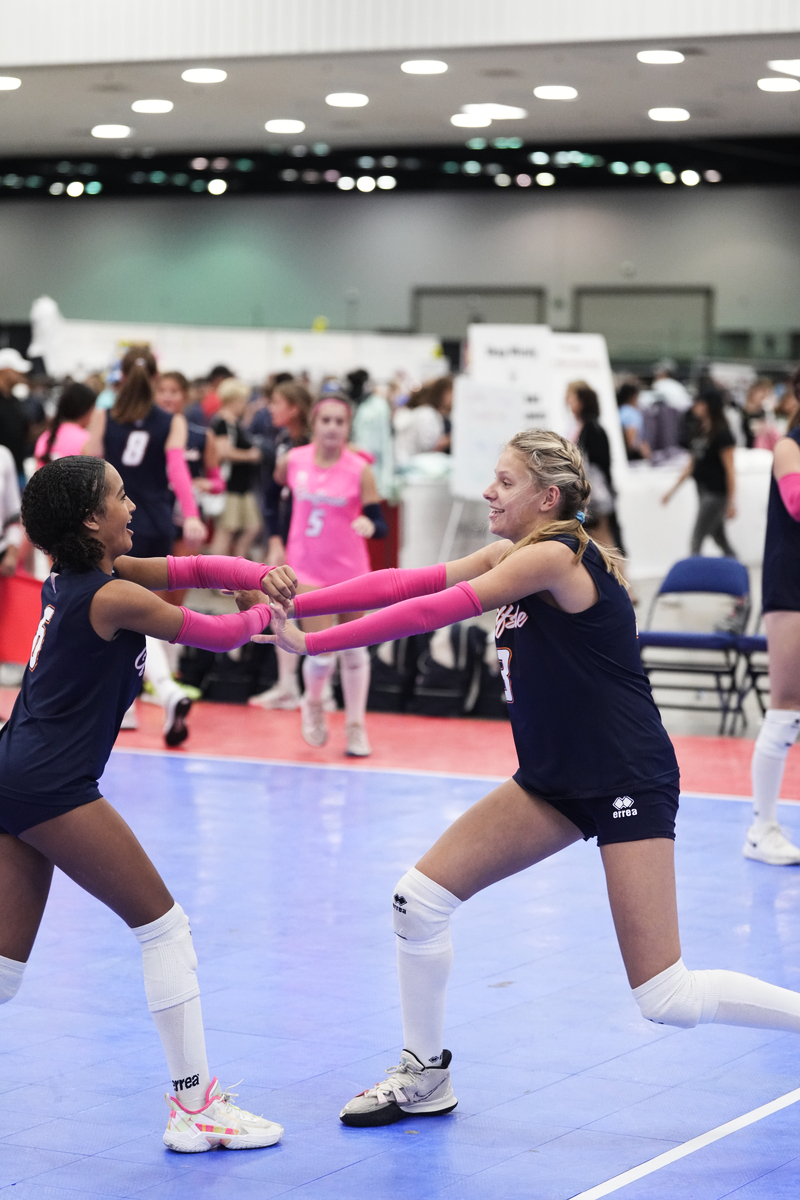 Two girls cheering