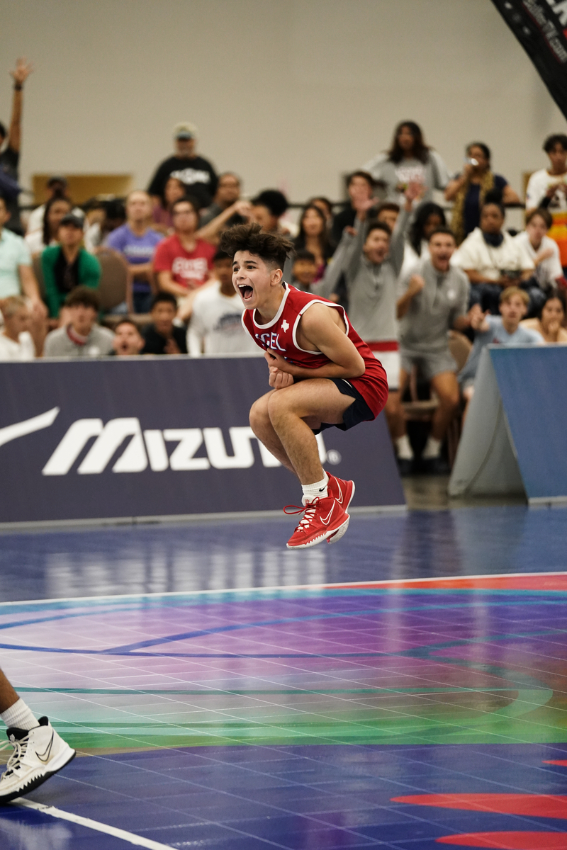 Boy celebrating on court