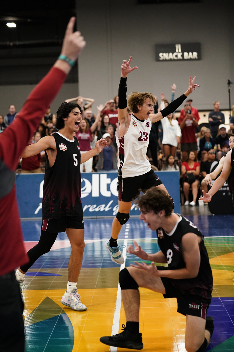 Boys celebrating on court