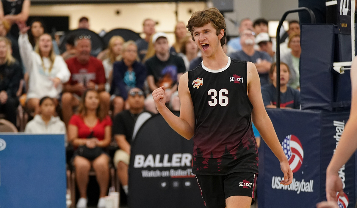 Boy celebrating on court