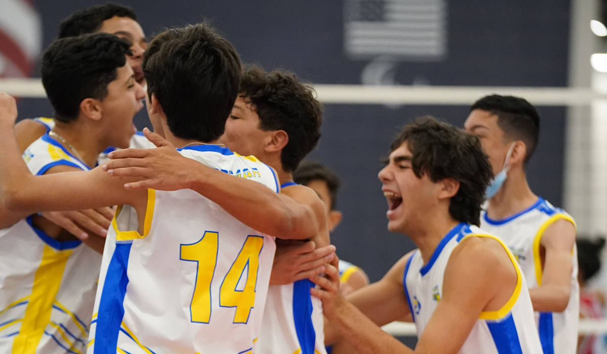 Boys celebrating on court