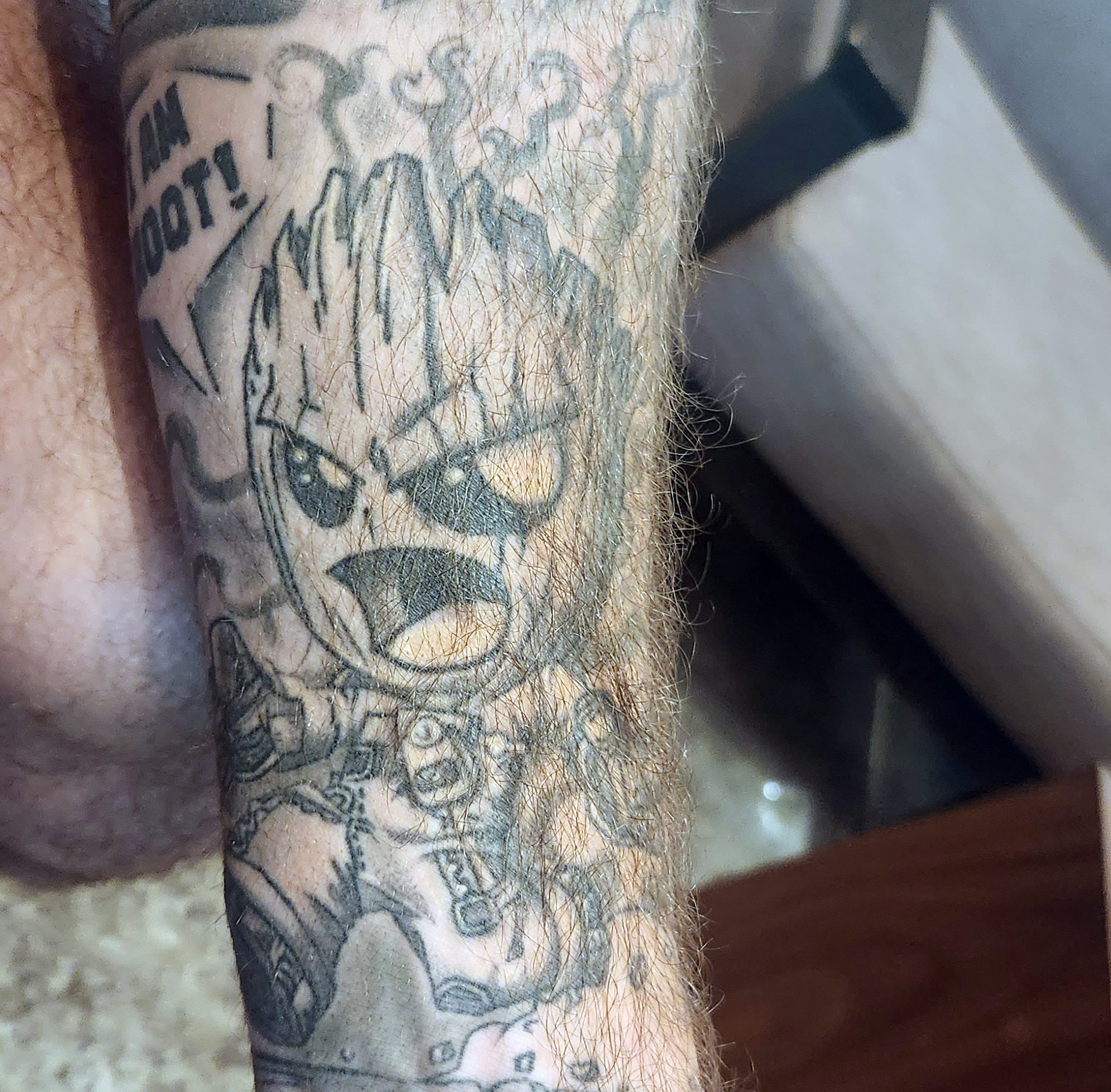 Photo of a tattoo of Baby Groot shouting "I Am Groot!"